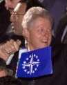 Clinton waves a NATO flag